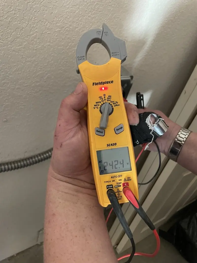 Voltage testing with clamp meter during Generator Installation in Hayward